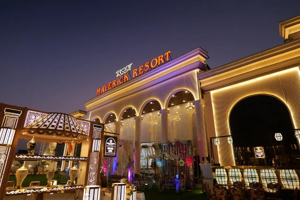 Maverick Resort Saguna Khagaul Road Illuminated Grand Facade and Lawn